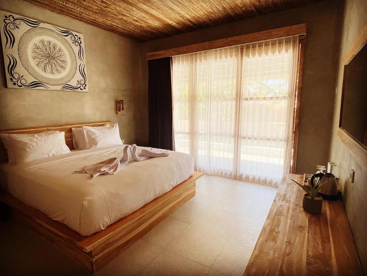 Golden Garuda Cottages Polilit Exterior foto